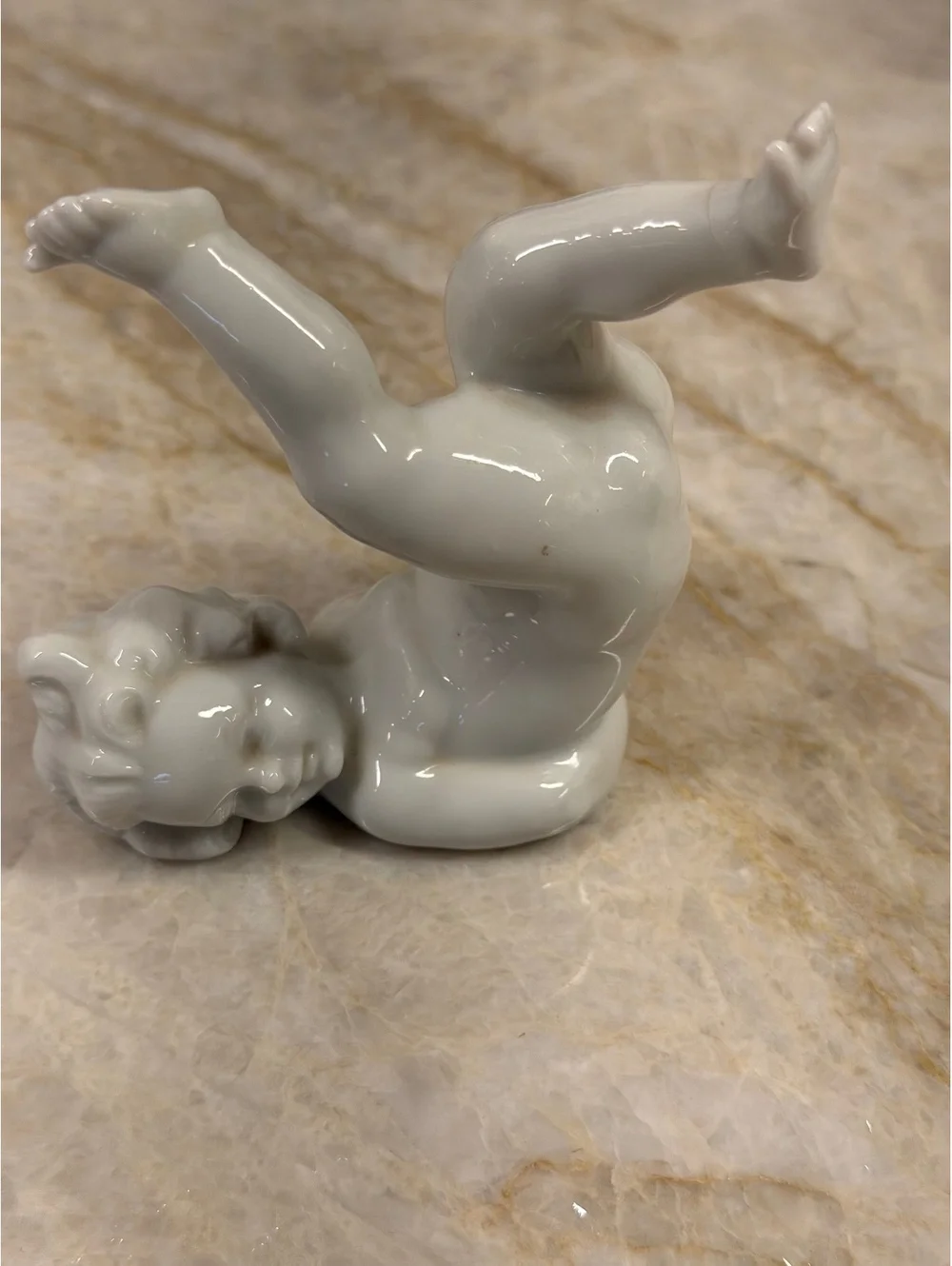 Vintage Porcelain Tumbling Cherub Figurine
